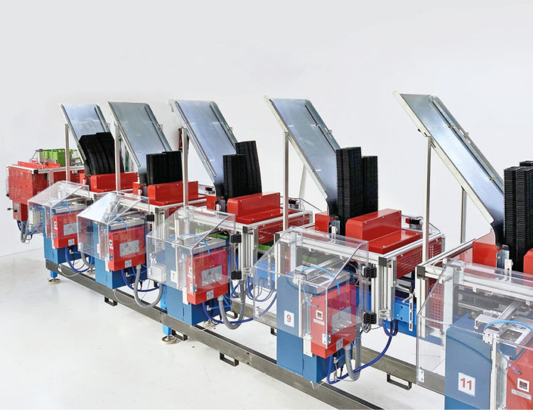  Labelling machines mounted in series with destackers URBINATI